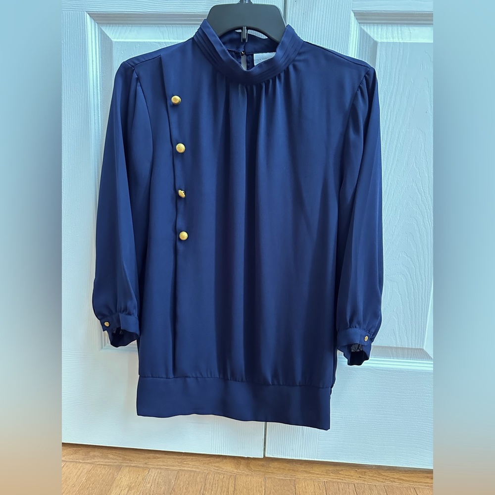 3/4 sleeve, mock turtle neck with decorative gold buttons